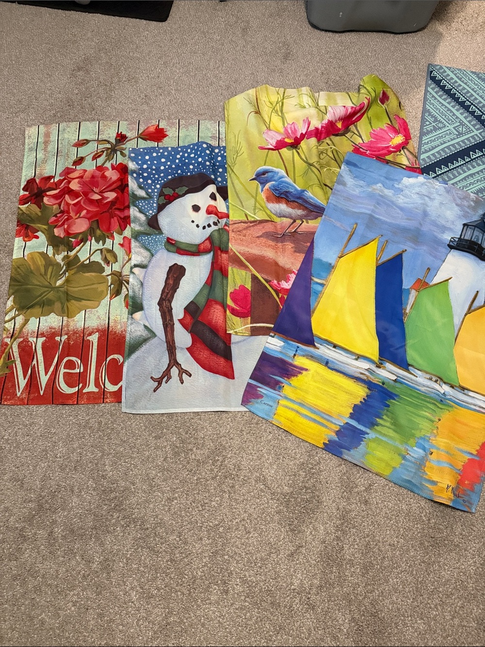 Set of Four Decorative Garden Flags - Floral, Snowman, Bird & Sailboat Designs